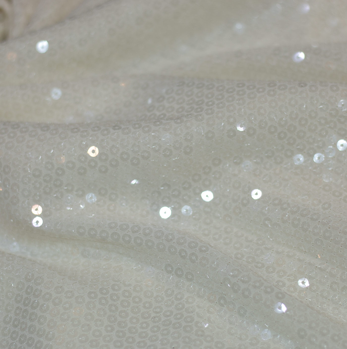Lightly Embroidered Cream Sequin Fabric