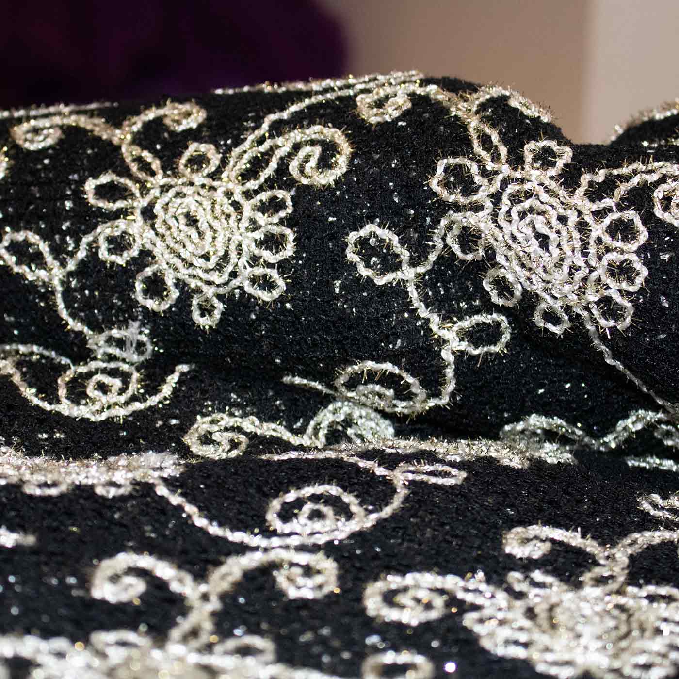 black-and-off-white-embroidered-netting-fabric