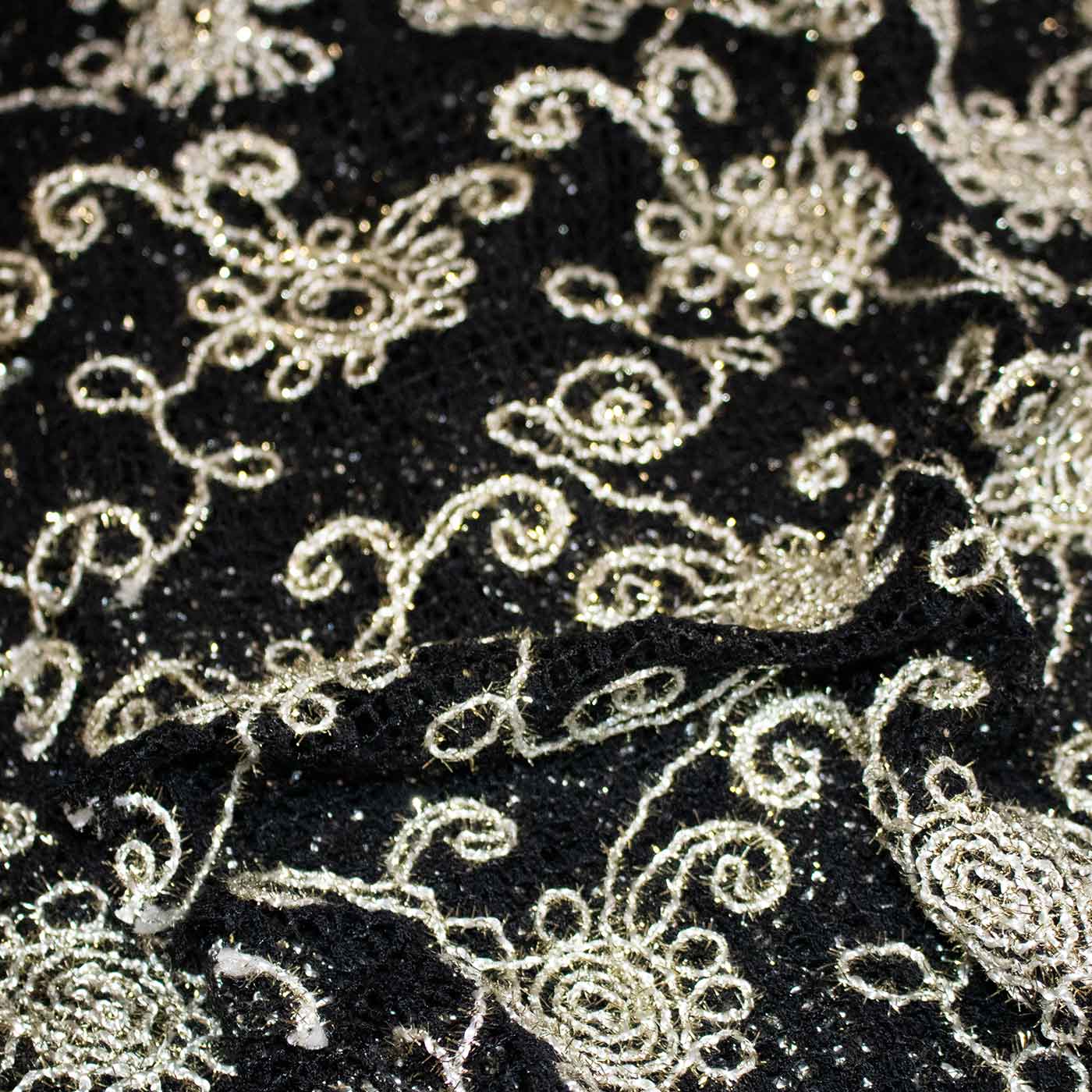 black-and-off-white-embroidered-netting-fabric
